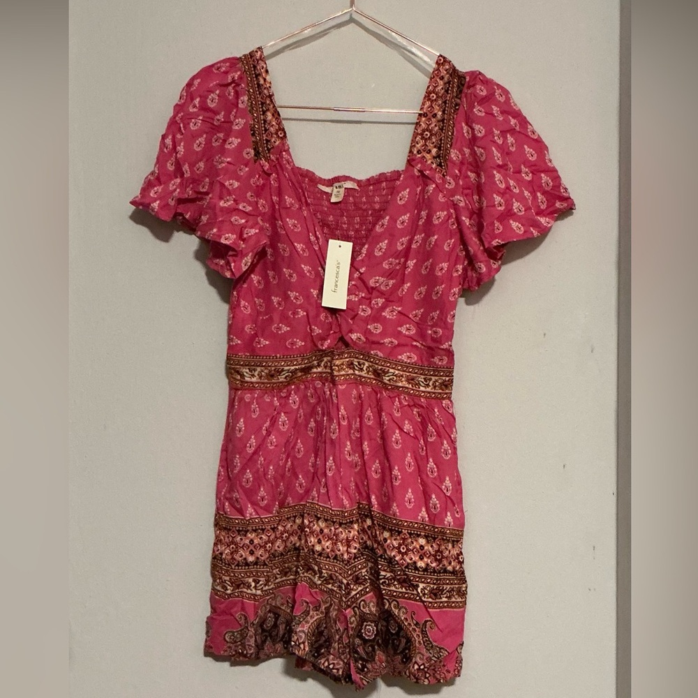 Pink romper with design